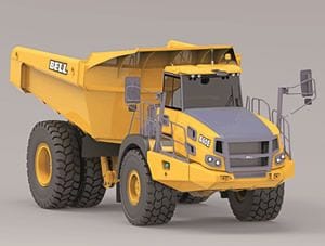Articulated dump truck hauling heavy dirt at a construction site